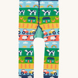 Frugi knitted leggings farm and tractor back detail on a cream background.