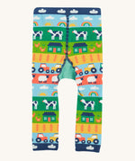 Frugi knitted leggings farm and tractor back detail on a cream background.