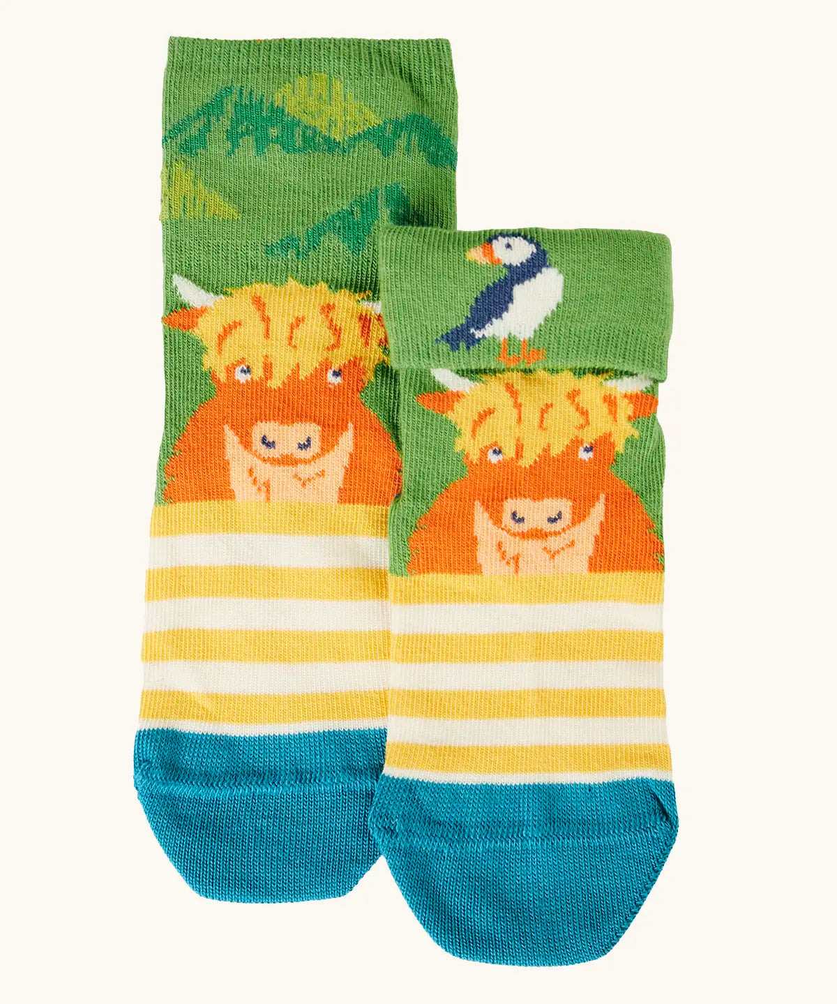 Frugi GOTS organic cotton socks showing a yellow stripes with a little Highland cow with details hidden under the cuff