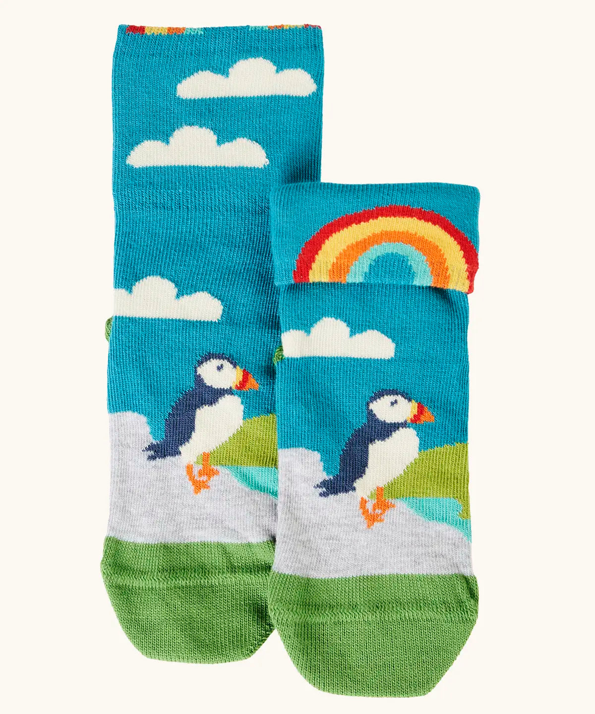 Frugi GOTS organic cotton socks showing a blue sky landscape with a puffin with details hidden under the cuff