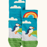 Frugi GOTS organic cotton socks showing a blue sky landscape with a puffin with details hidden under the cuff