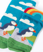 Frugi GOTS organic cotton sock showing one pair in sky blue with a perched puffin and rainbow and details hidden under the cuff