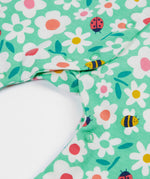 Frugi green baby grow busy bugs leg detail
