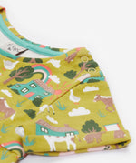 Frugi green dress farm neck and arm detail