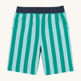 Frugi shorts in green stripes on a cream background.