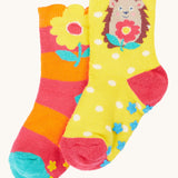 Frugi organic cotton 2 pack socks laid flat. In a floral and hedgehog themed colours and designs 
