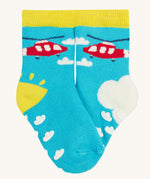 Frugi 2 pack grippy socks helicopter design on a cream background.