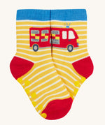 Frugi 2 pack grippy socks fire engine design on a cream background.
