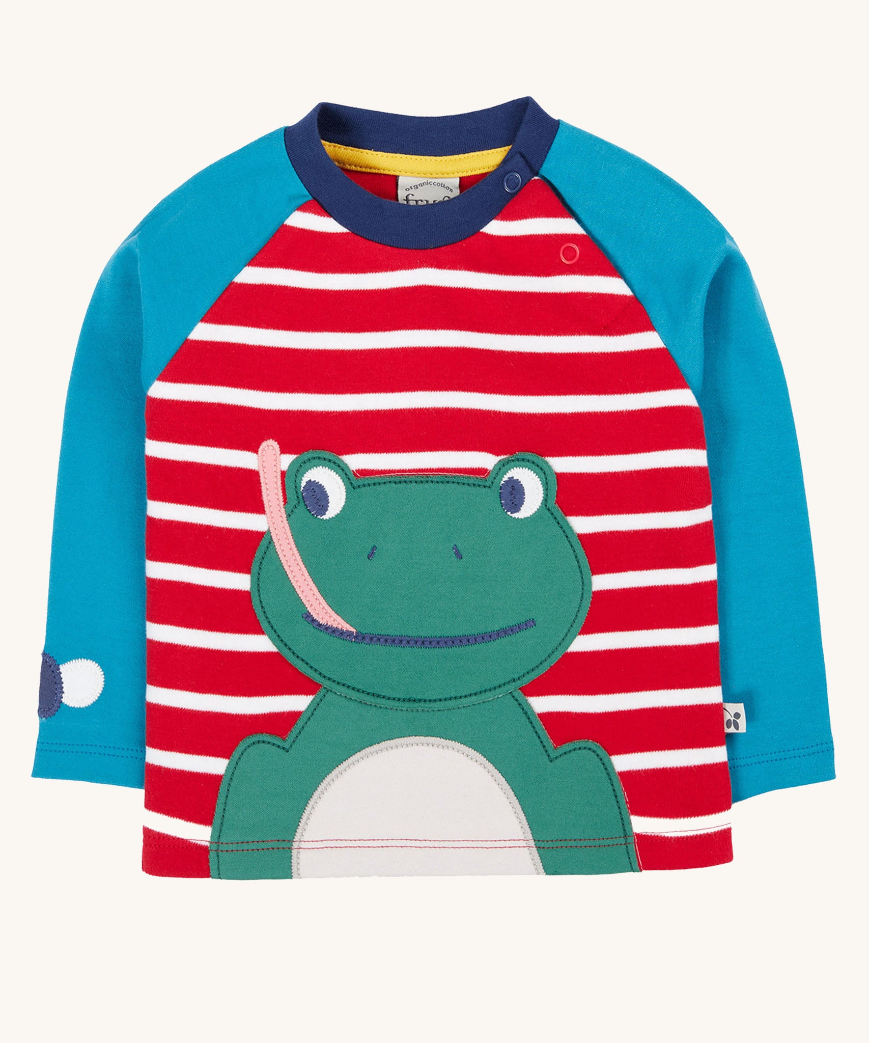 Frugi kids alfie raglan top in berry red/ breton frog available at Babipur. A GOTS organic cotton top with blue long sleeve and red/white stripes. Features a playful green frog applique on the front and popper fasteners on the shoulder.