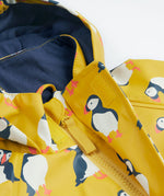 Frugi kids puddle buster jacket yellow with a puffin design hood and zip detail