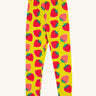 Frugi yellow leggings strawberry patch design on a cream background