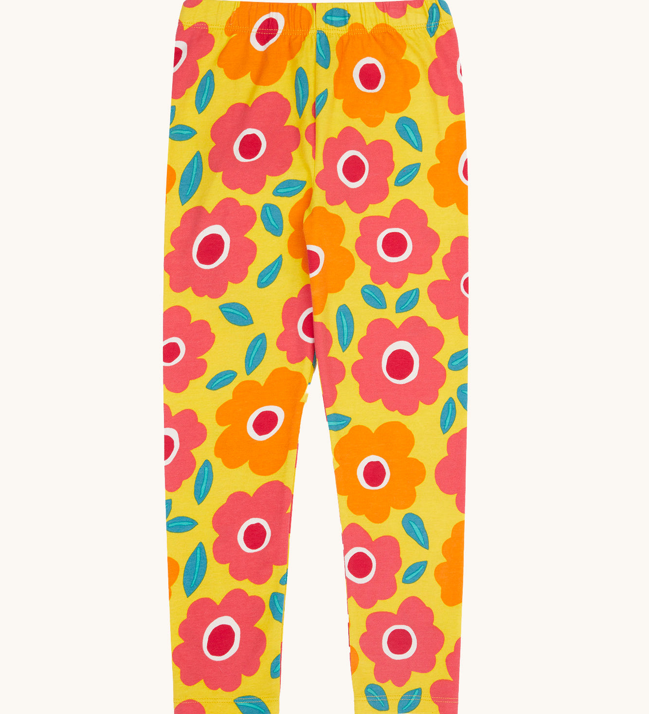 Frugi organic cotton leggings laid flat. In bright yellow with a repeating floral print