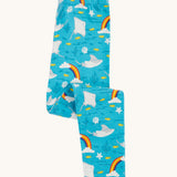 Frugi organic cotton leggings folded and laid flat. In bright blue with a repeating grey manta ray and rainbow print