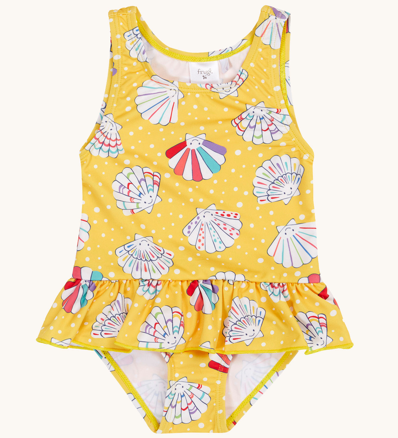 Frugi yellow swim suit with a repeating white shell design. Features a frill around the waist.