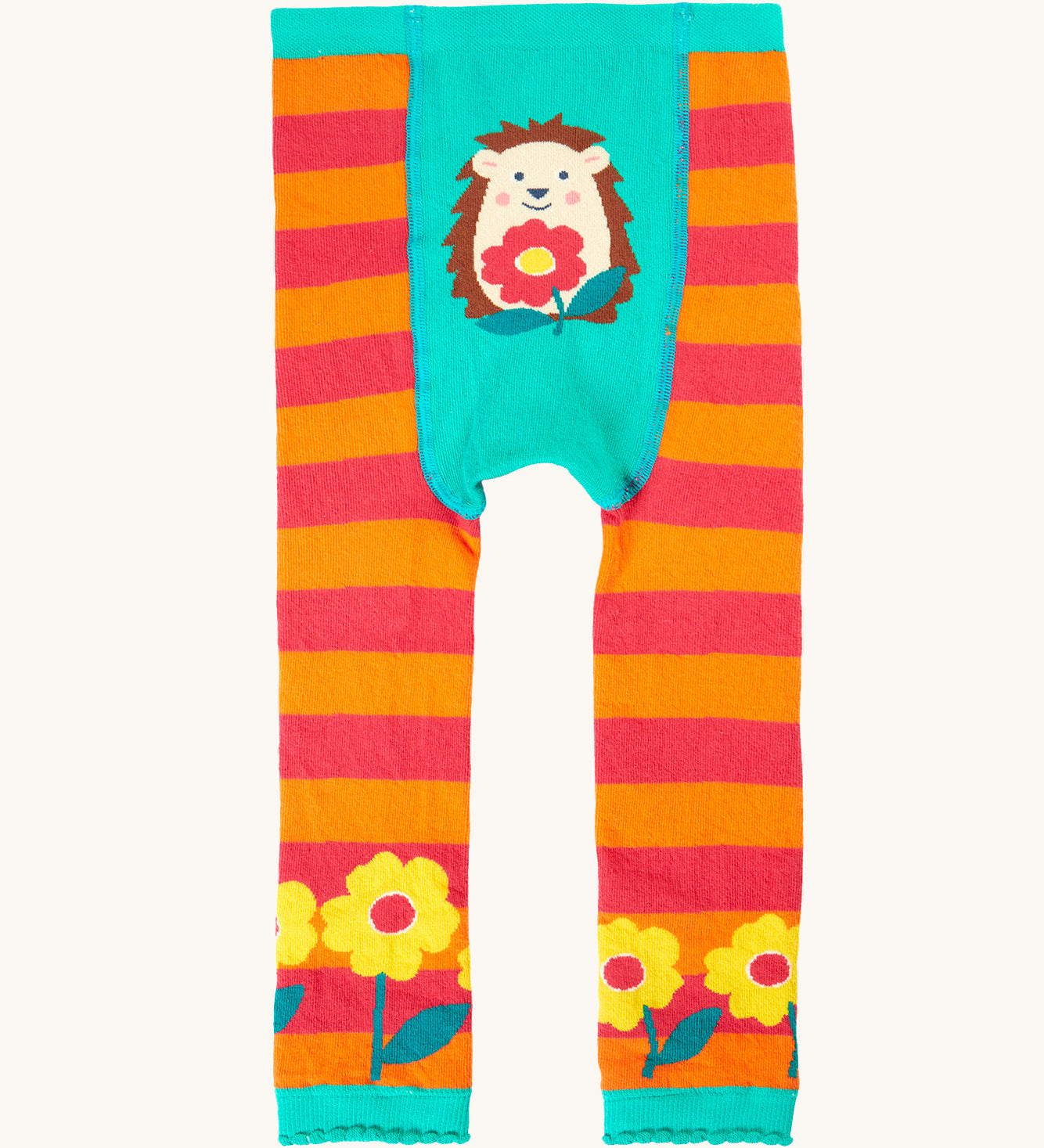 Frugi organic cotton knitted leggings. In orange and pink stripe with a hedgehog design on the front and yellow flowers on each leg