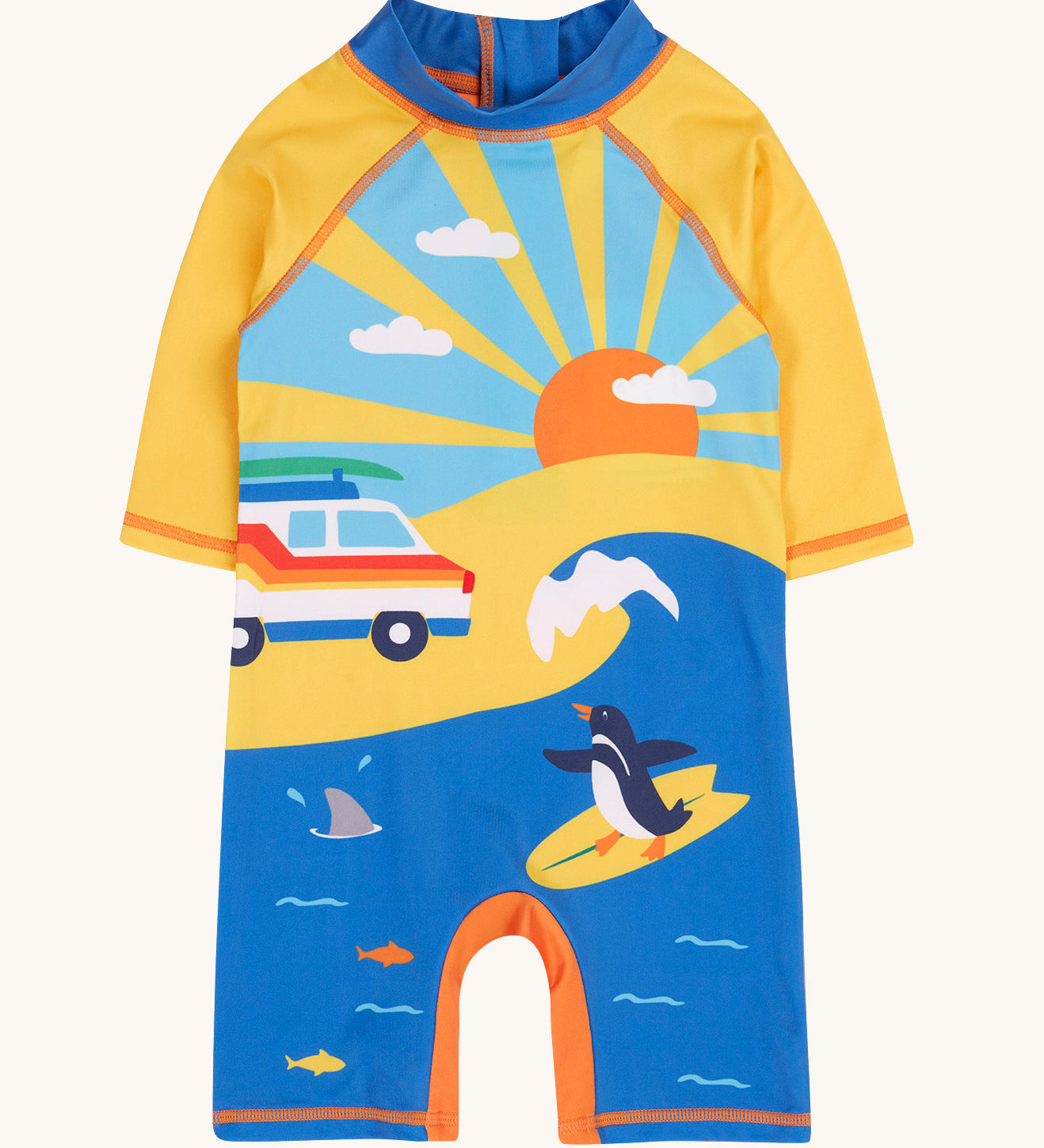 Frugi recycled plastic sun safe swimwear all in one suit laid flat. In a sunny ocean theme design featuring a retro camper van and a surfing penguin