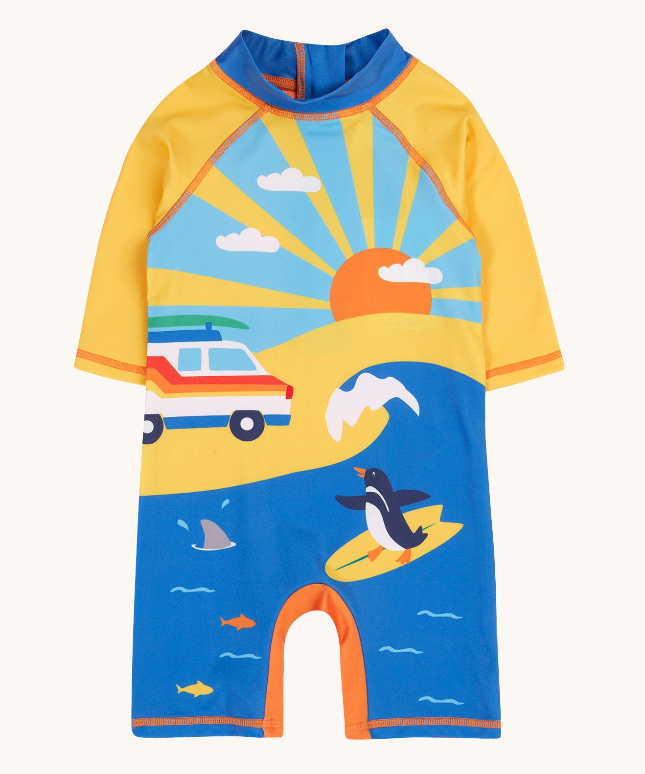 Frugi recycled plastic sun safe swimwear all in one suit laid flat. In a sunny ocean theme design featuring a retro camper van and a surfing penguin