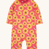 Frugi all in one sun safe swimwear suit. In pink with a repeating yellow sunflower and flying bee print