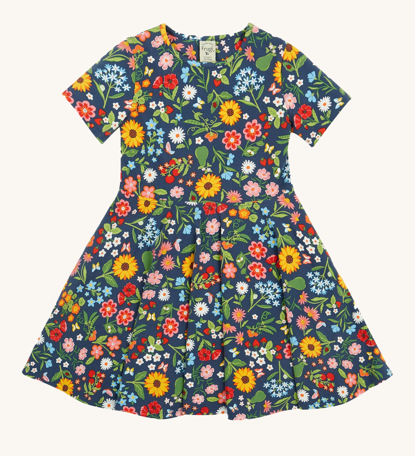 Frugi navy skater dress potager garden design on a cream background.