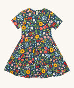 Frugi navy skater dress potager garden design on a cream background.