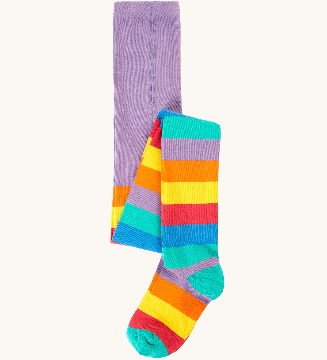Frugi organic cotton tights laid flat. In light purple with a rainbow stripe design on the bottom half.
