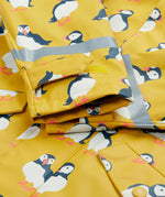 Frugi kids puddle buster jacket yellow with a puffin design cuff detail