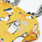 Frugi yellow puddle buster trousers puffin design front detail