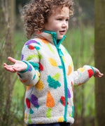 Frugi white fleece veg patch design 