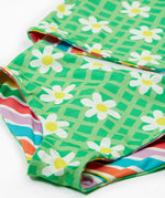 Frugi reversible tankini in a green daisy and summer stripe design daisy print detail