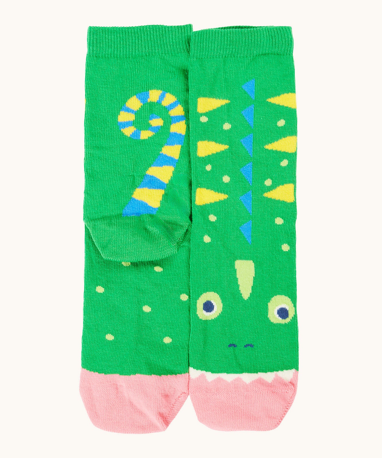 A green playful reptile themed Frugi organic cotton sock laid flat 
