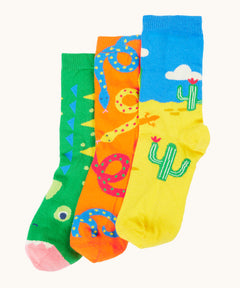 Frugi 3 pack organic cotton socks laid flat. In reptile themed colours and designs