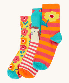 Frugi 3 pack organic cotton socks laid flat. In garden themed colours and designs