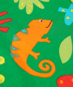 A close up of the orange chameleon design on the Frugi green samson printed shorts