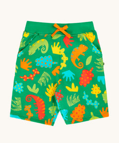 Frugi samson printed shorts laid flat. In bright green with a repeated chameleon and leaves print. Features a orange waist tie