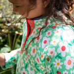 Frugi green snuggle fleece busy bugs design