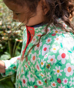 Frugi green snuggle fleece busy bugs design