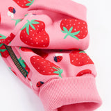 Frugi kids snuggle suit in strawberry design leg cuff detail