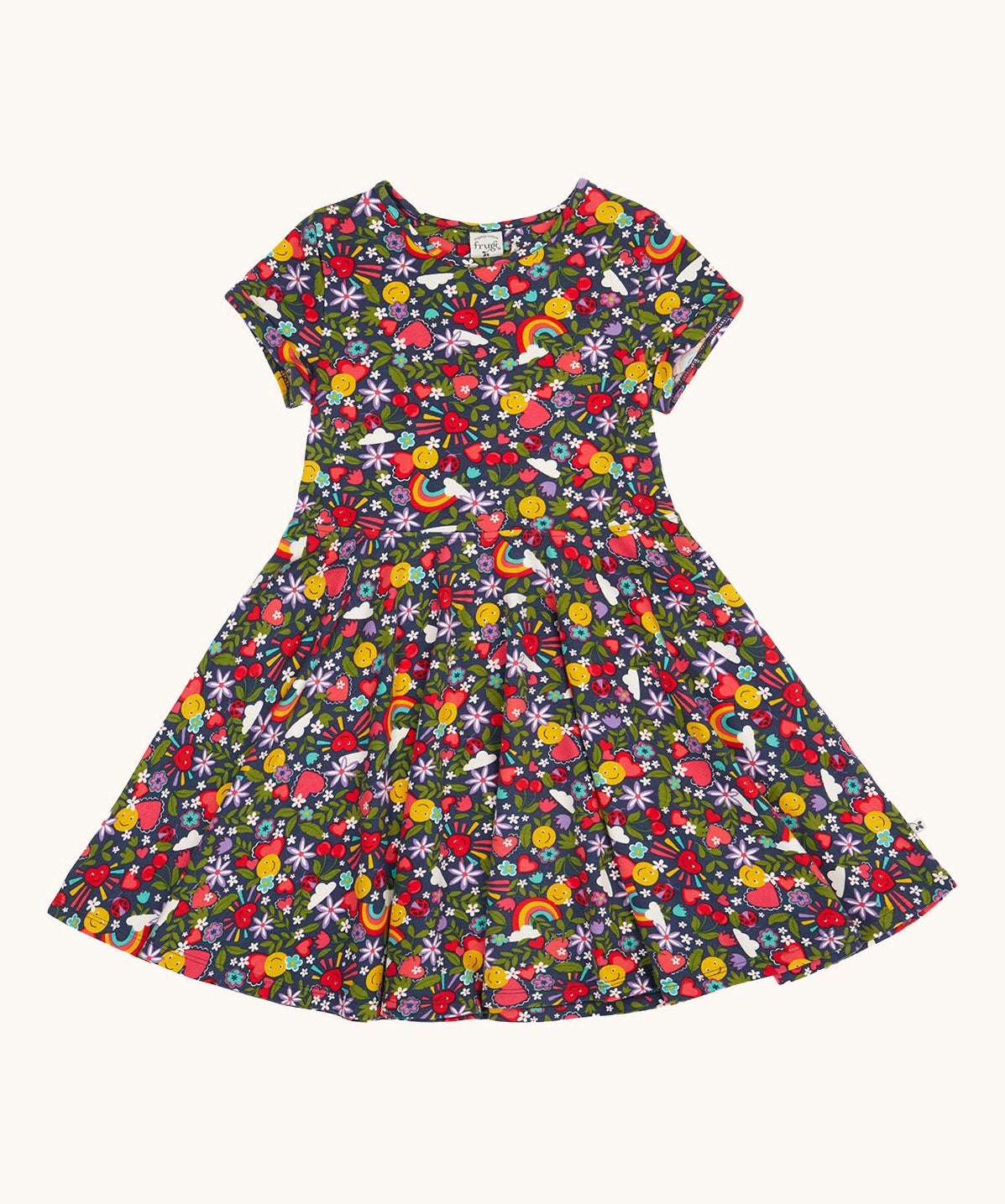 Frugi organic cotton skater dress laid flat. In navy with a repeating heart, sun rainbow and flower print.
