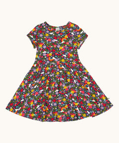 Frugi organic cotton skater dress laid flat. In navy with a repeating heart, sun rainbow and flower print.