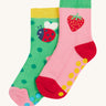Frugi 2 pack grippy socks strawberry and ladybird design on a cream background