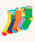 Frugi adventure themed multipack socks laid flat in different colours and designs