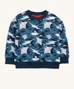 Frugi organic cotton sweatshirt laid flat. In dark blue and navy trim with a repeating grey manta ray and shark print.