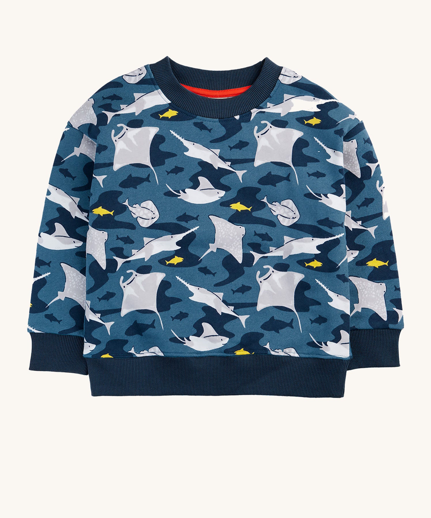 Frugi organic cotton sweatshirt laid flat. In dark blue and navy trim with a repeating grey manta ray and shark print.