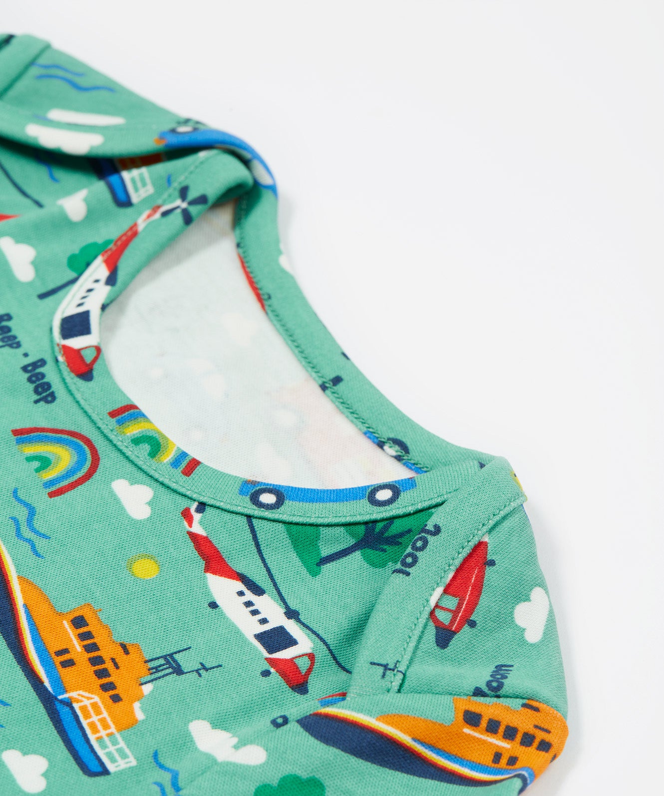 Frugi green dressing babygrow to the rescue neck detail