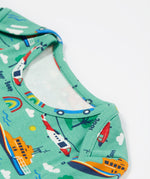 Frugi green dressing babygrow to the rescue neck detail