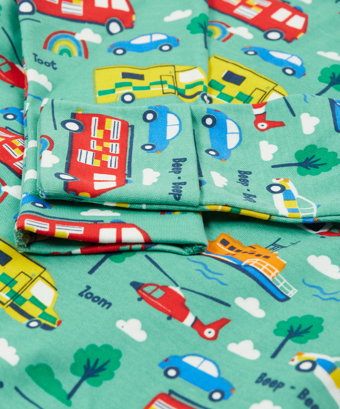 Frugi green dressing babygrow to the rescue cuff detail