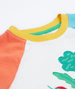 Frugi white short sleeve top, blue and red sleeves veg patch neck detail
