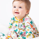 Frugi white baby grow dino land design