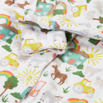 Frugi white baby grow farm life cuff detail