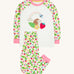 Frugi white pyjama set strawberry field design on a cream background.